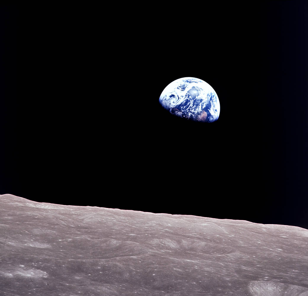 A photograph of the Earth in shadow, taken from the moon.