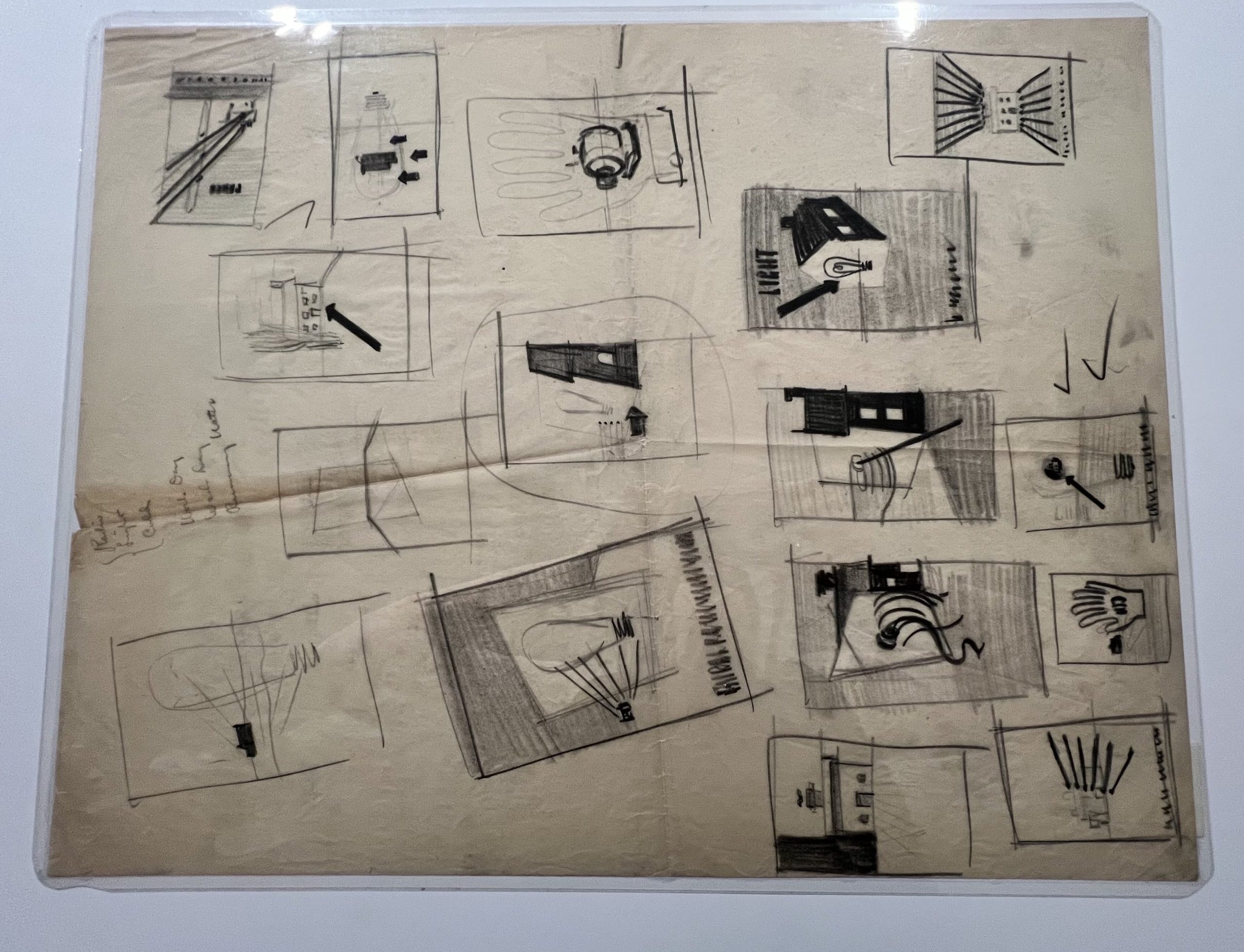 14 black-and-white sketches on one sheet for posters about electricity, including notes and checkmarks.