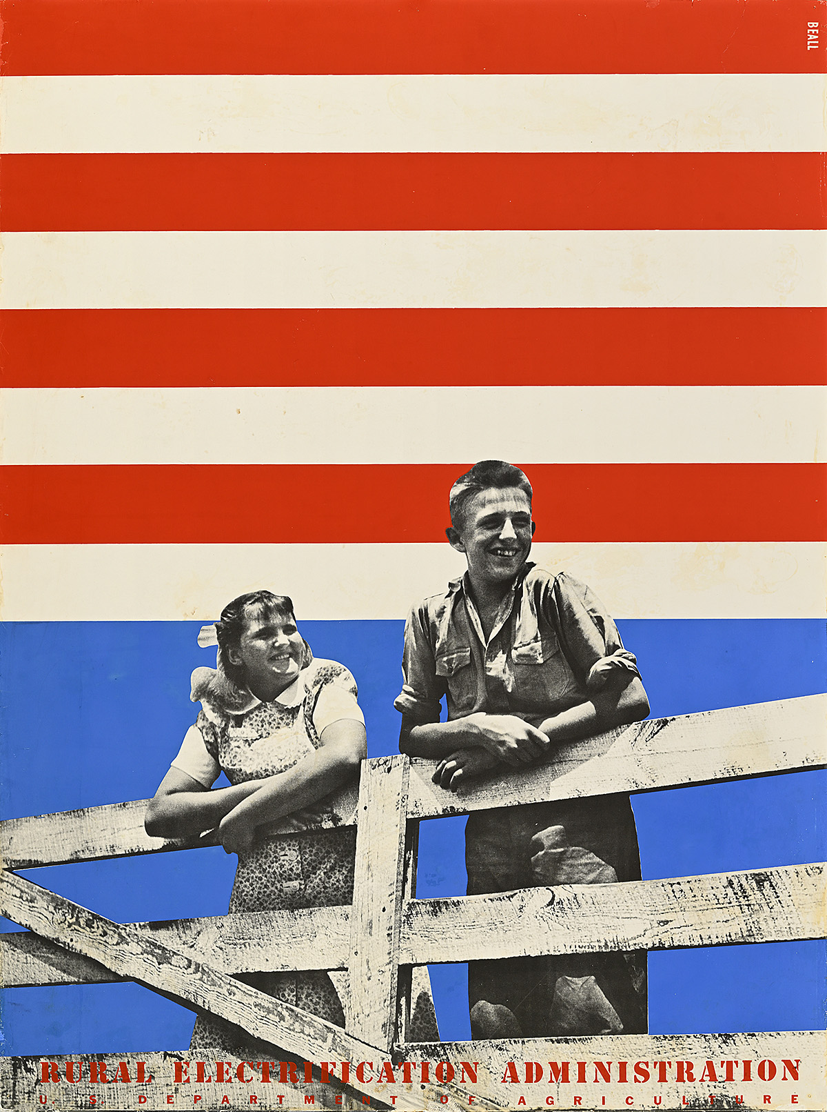 A poster of 2 smiling white children hanging on a wooden gate against a background of red, white, and blue stripes.