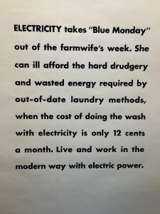 Black text on a black background advertising electric power.