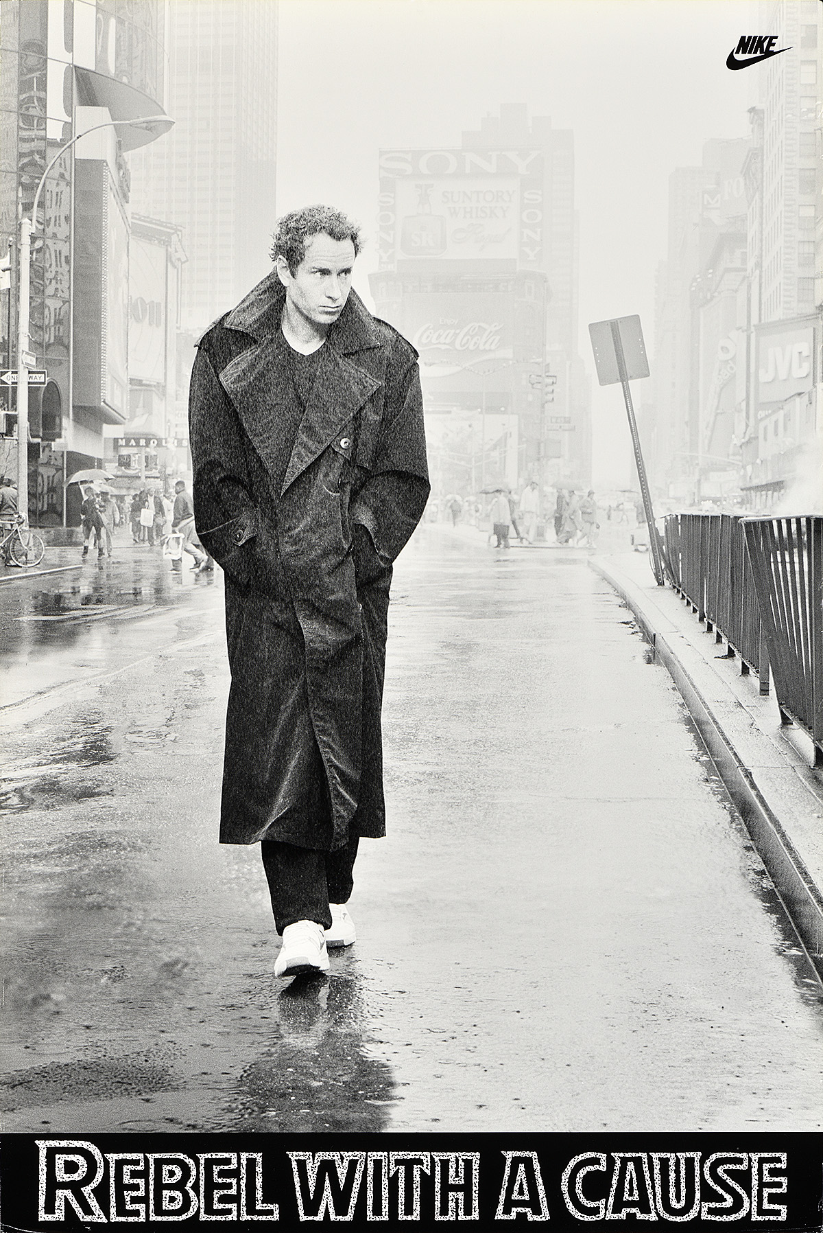 A black-and-white poster of a moody white man in a trenchcoat walking down a rainy city street.