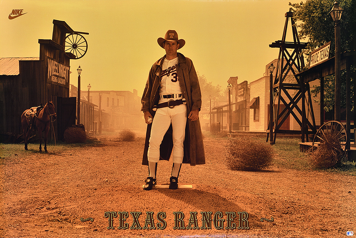 A poster of a white man in a baseball uniform and a cowboy hat posing in a deserted town