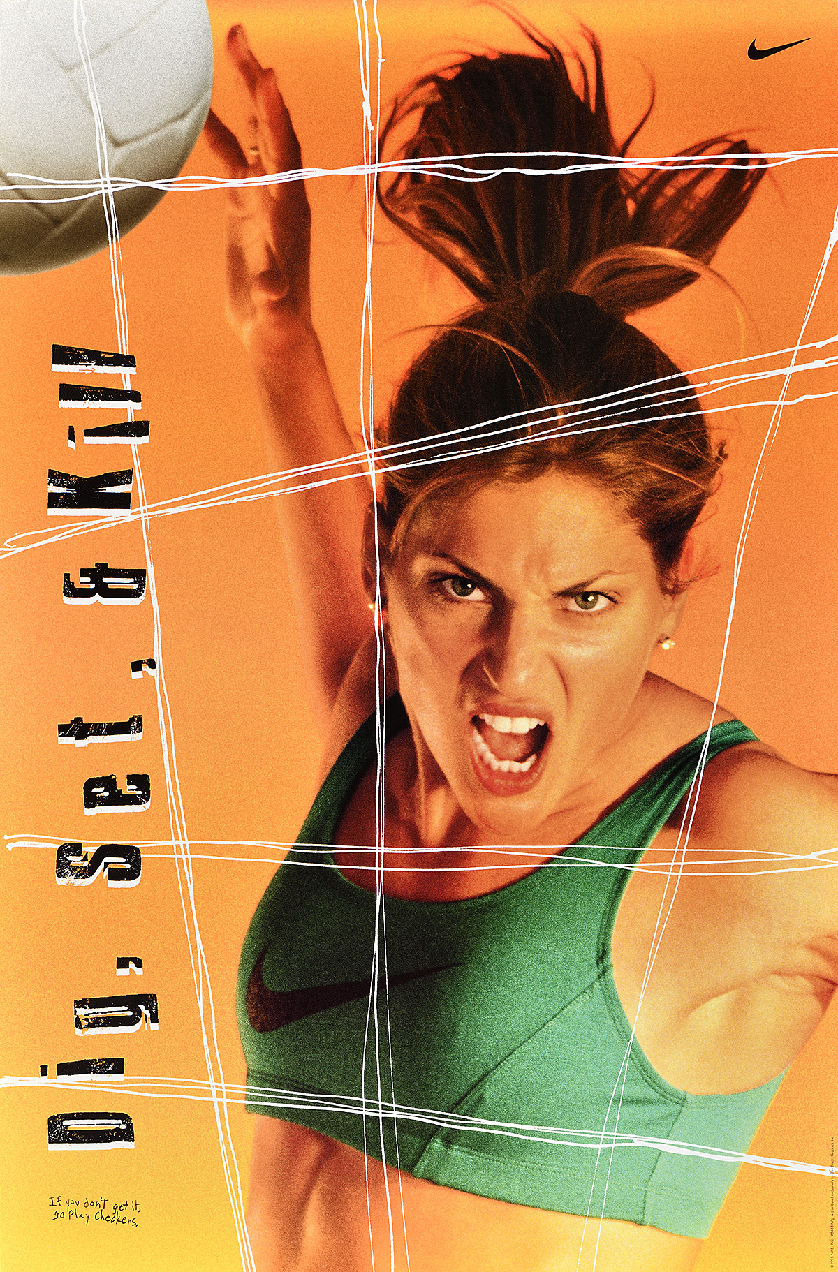 A poster of a woman in a green sport's bra with a fierce expression.