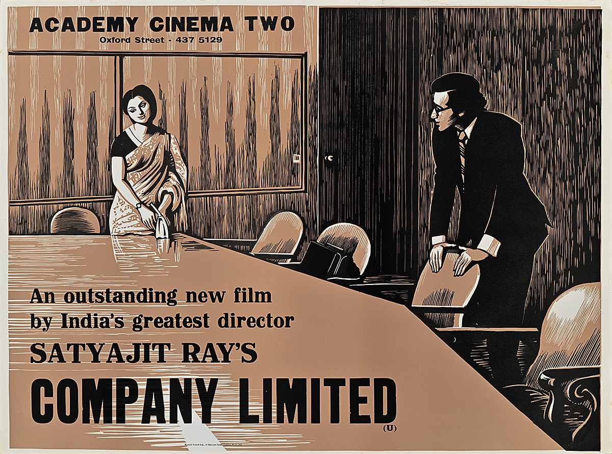 A poster of a man in a suit and a woman in a sari standing around a large wooden table.