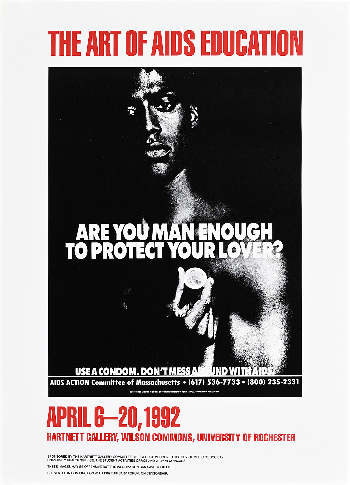 A poster of a Black man holding a condom looking at the camera on a black background with a white border.