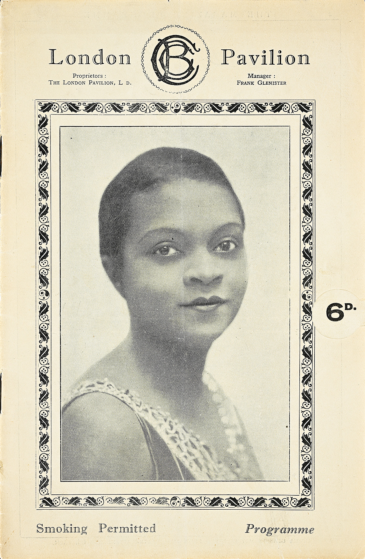 A black and white photograph of a young woman's face surrounded by a decorative rectangular border.