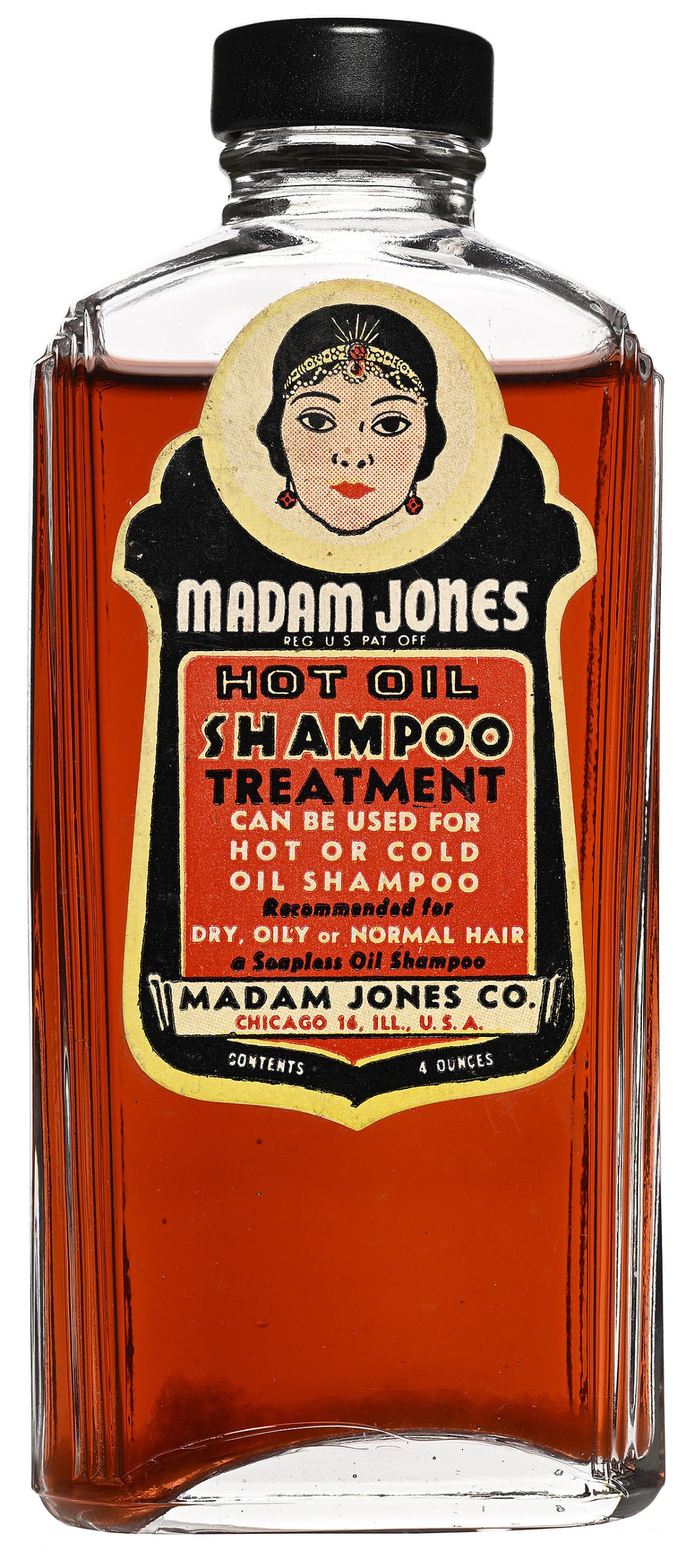 A glass bottle with a red liquid inside.