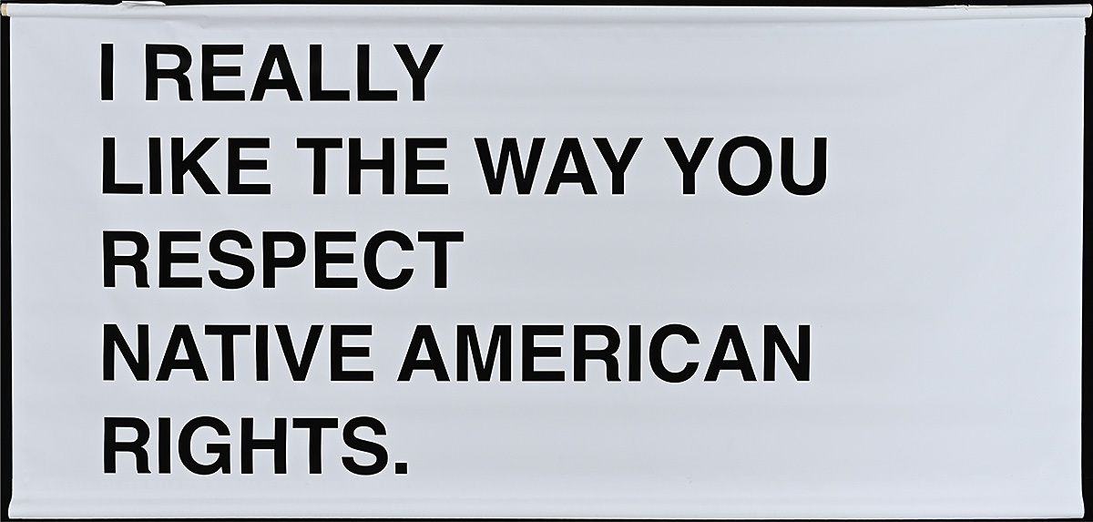 A white banner with black sans serif text in all capital letters.