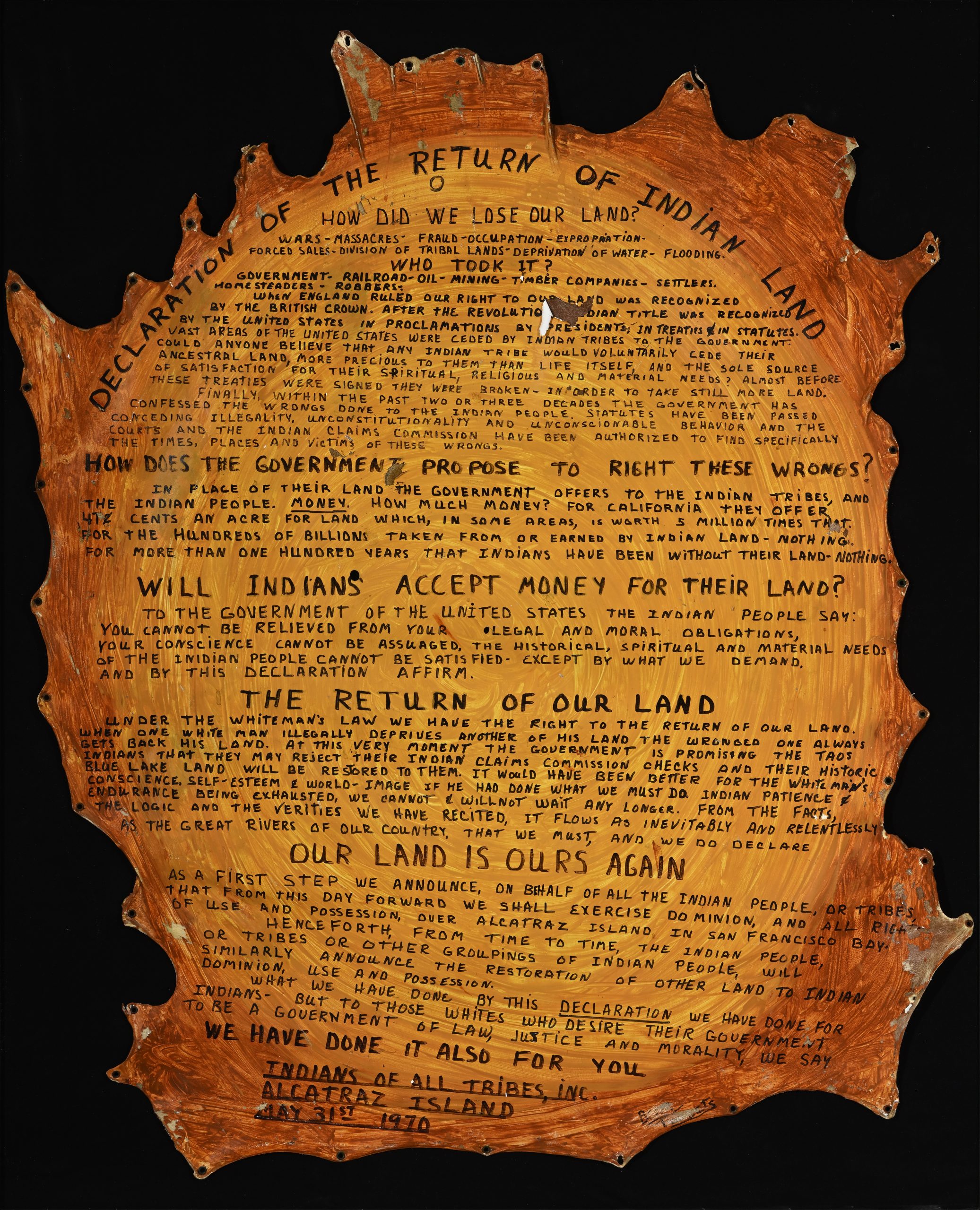 A stretched piece of animal skin filled with small black handwriting.