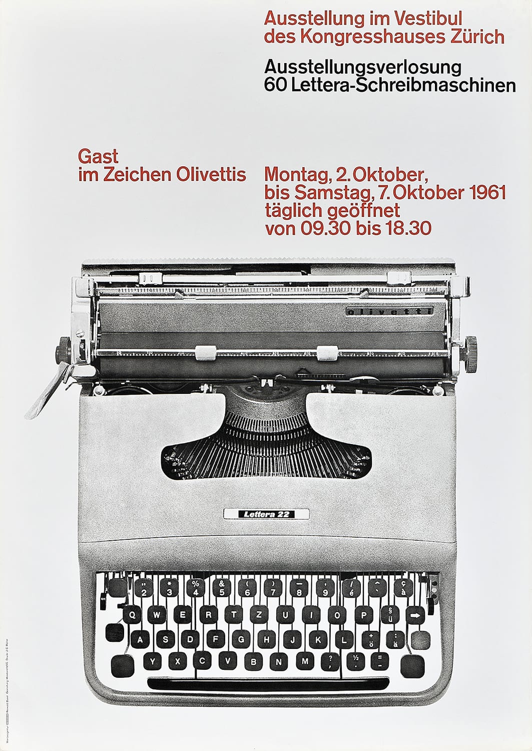 A poster with an aerial view of a black and white typewriter below red and black text.