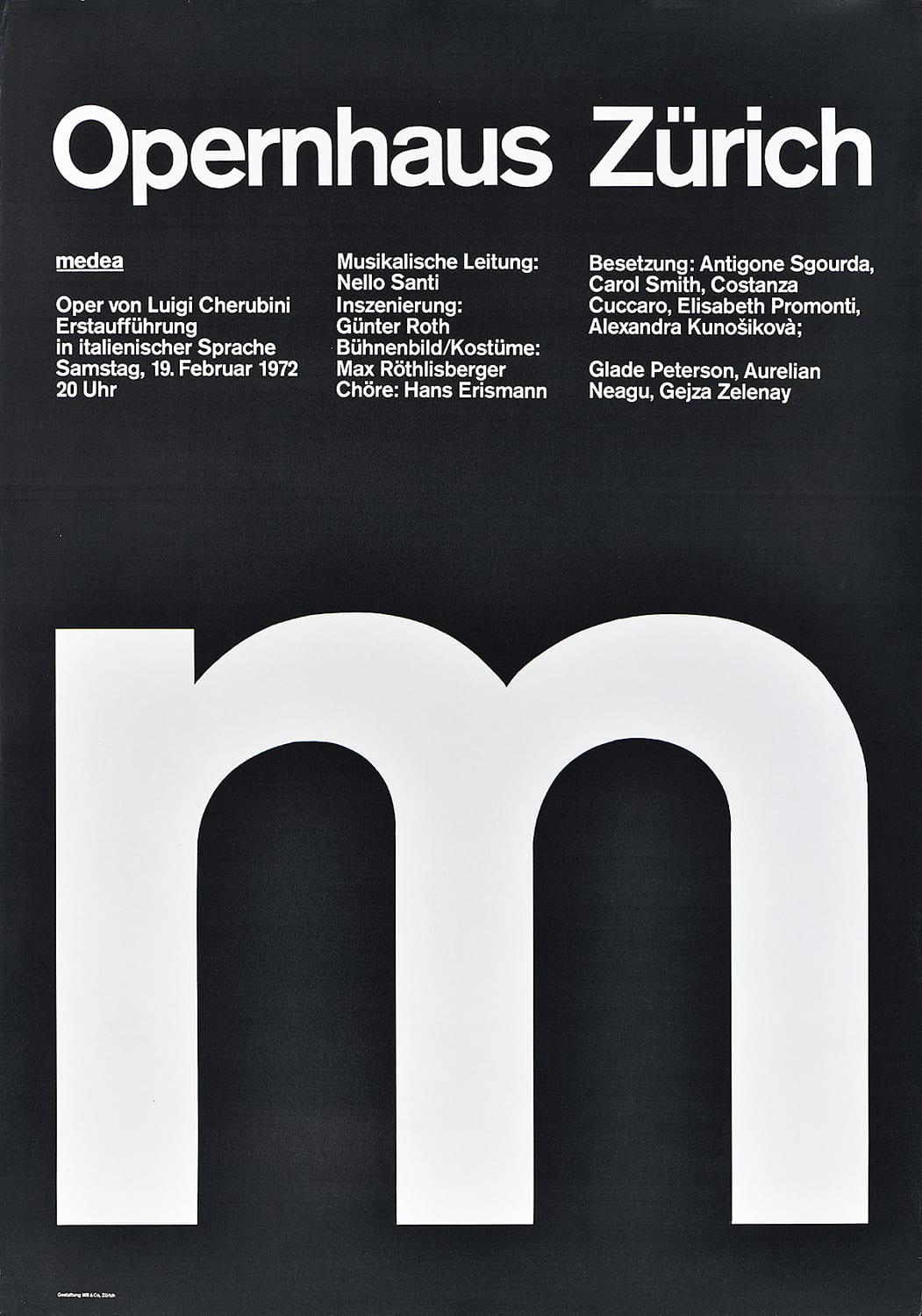 A poster with a large white lower case 