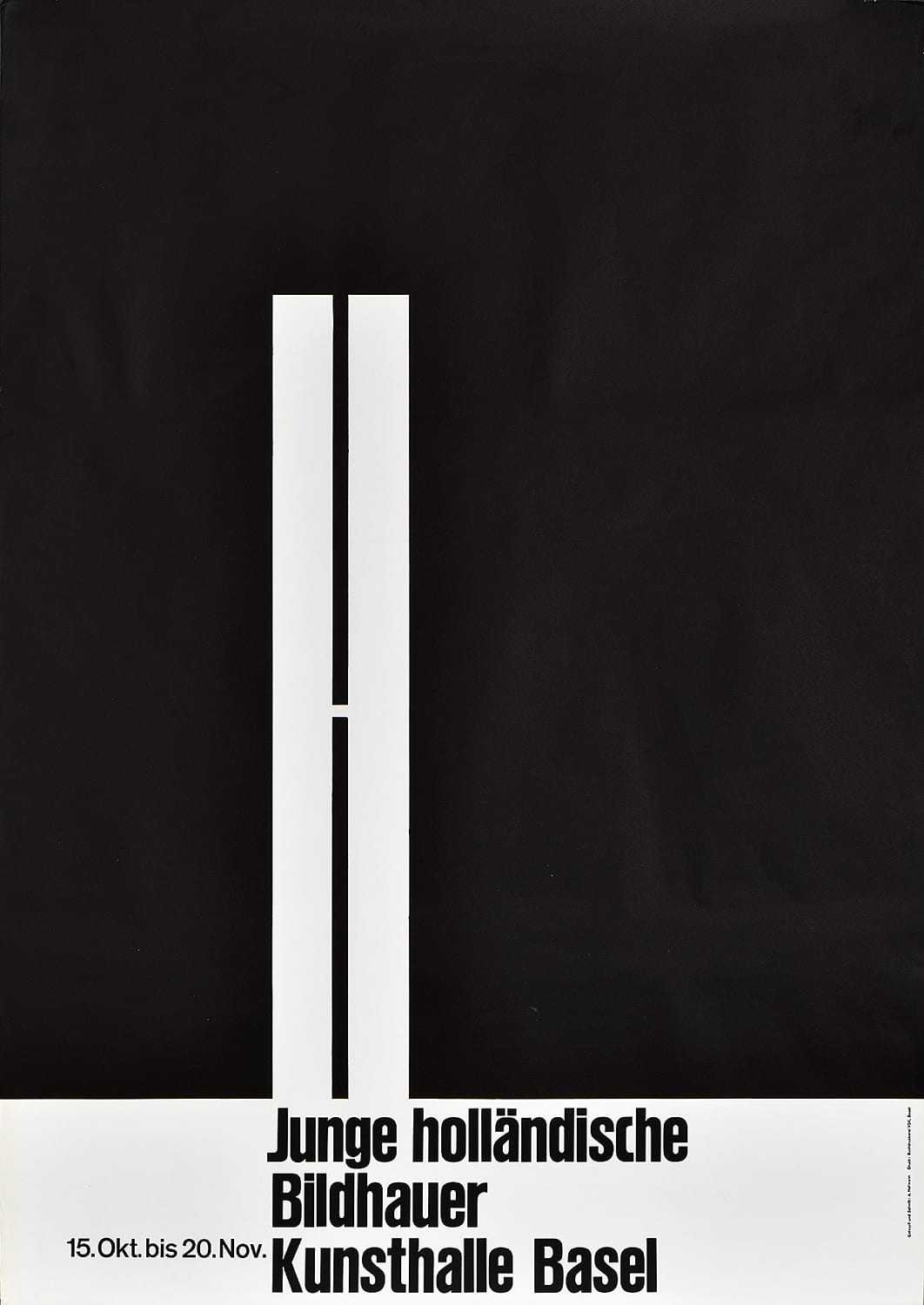 A poster with a skinny, white, condensed capital 